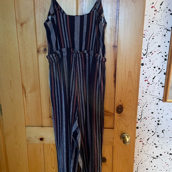 Striped vacation jumpsuit. The most versatile vacationing piece you can pack. - Picture 5 of 5